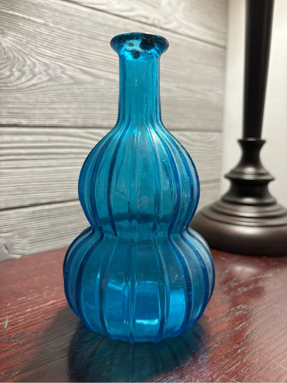 Vintage Blue Glass Decanter 100% recycled glass with a textured diamond pattern.